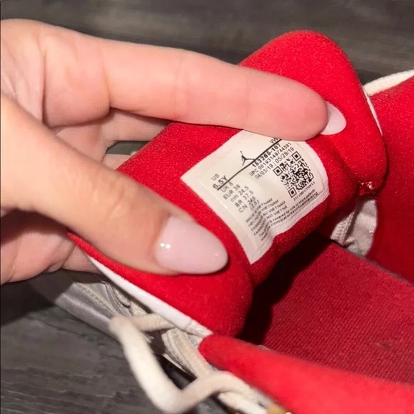Air Jordan White and Red Sneakers - Picture 2 of 3